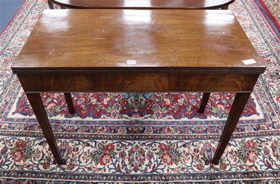 A George III mahogany folding tea table W.96cm